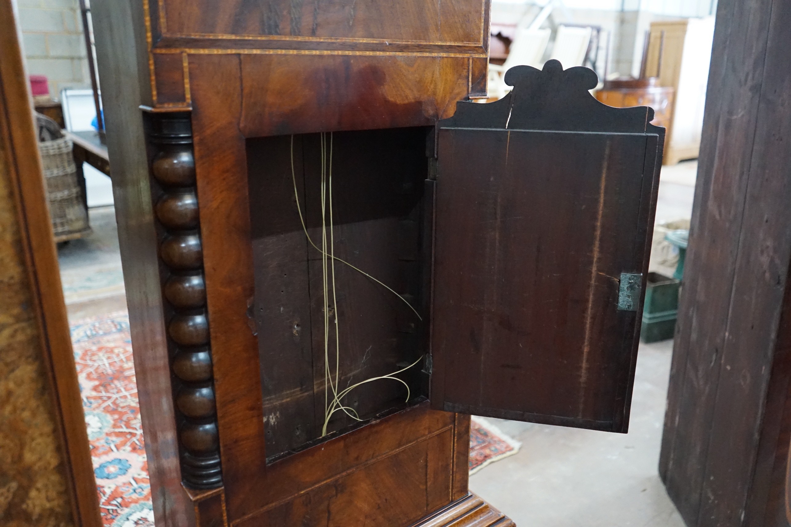 A Victorian mahogany eight day longcase clock marked Bates, Huddersfield